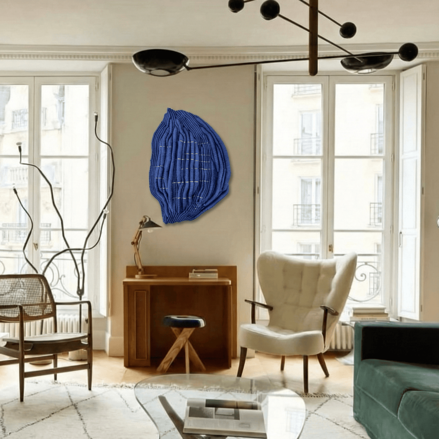 Blue contemporary fibre wall art in a light-filled living room
