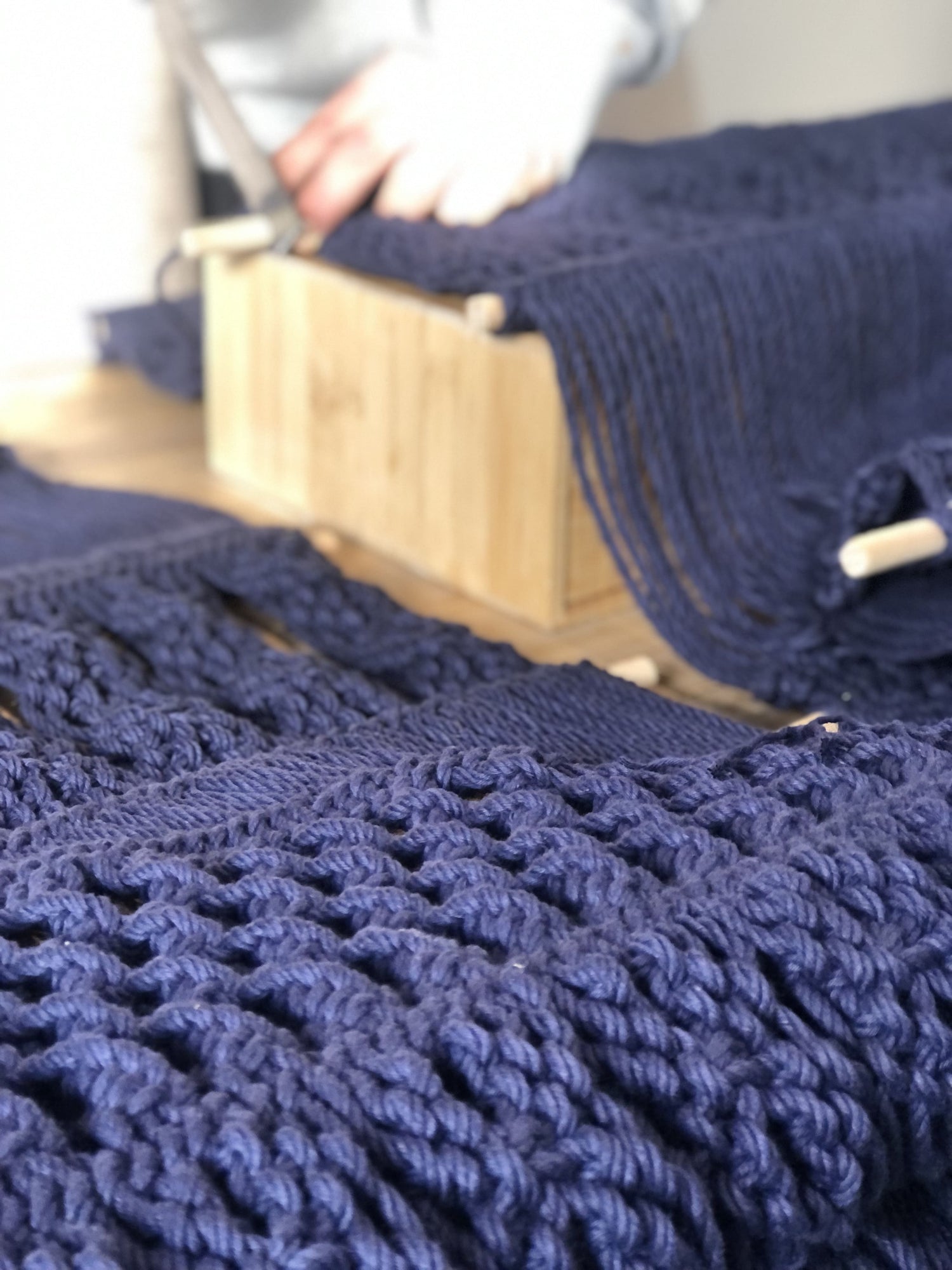 Final stages of a bespoke fibre art piece, ready for client approval before installation -- knotted by hand