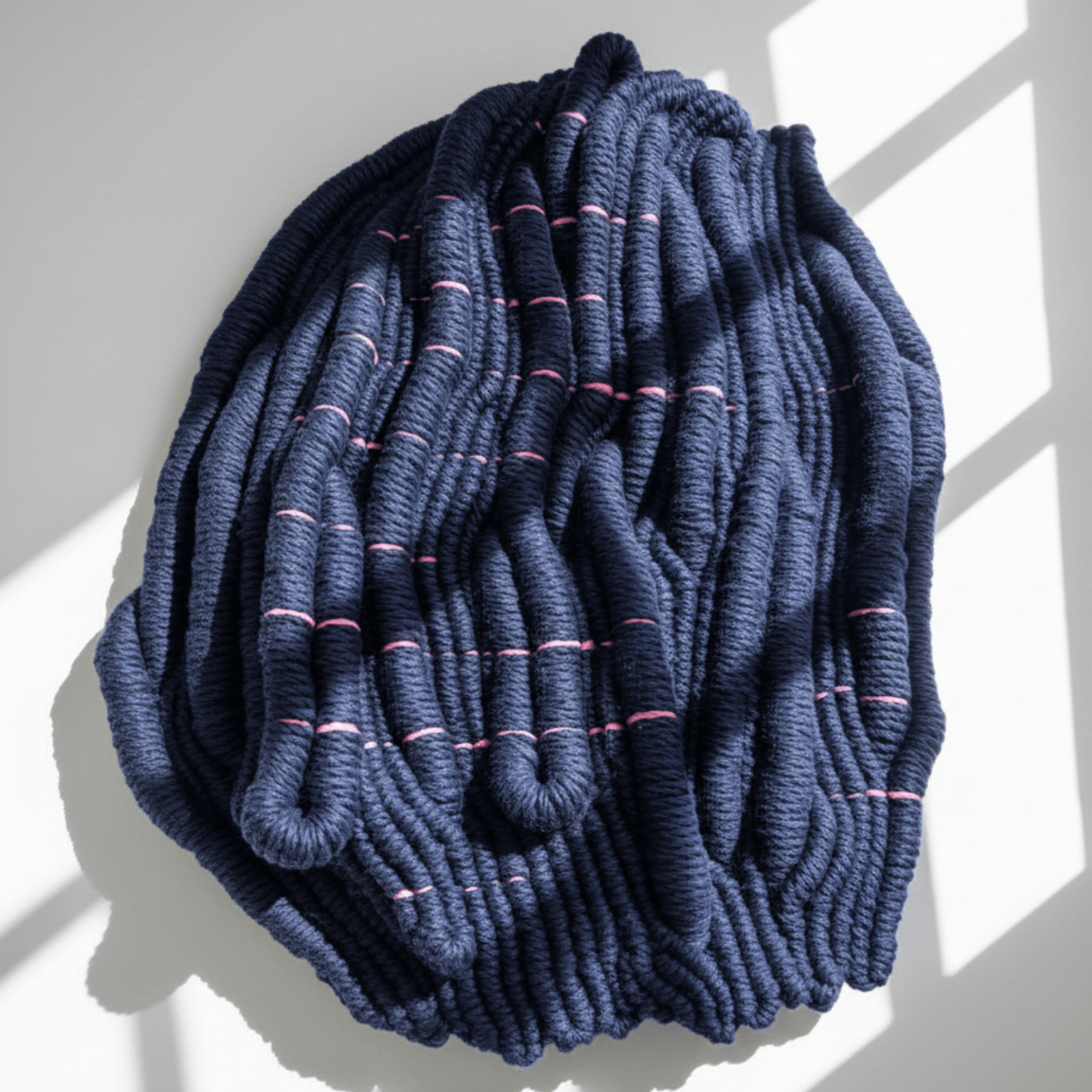 Hand-knotted fibre wall art with sculptural texture for modern interiors