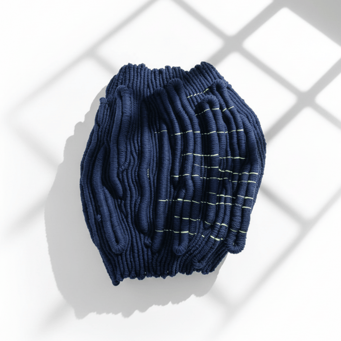 Echo I – navy blue sculptural fibre wall art
