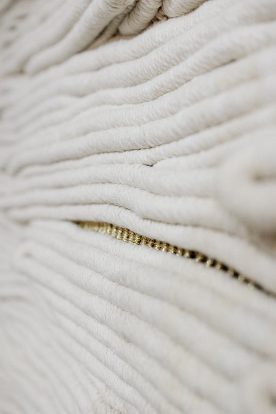 Close-up of textural fibre art, knotted by hand