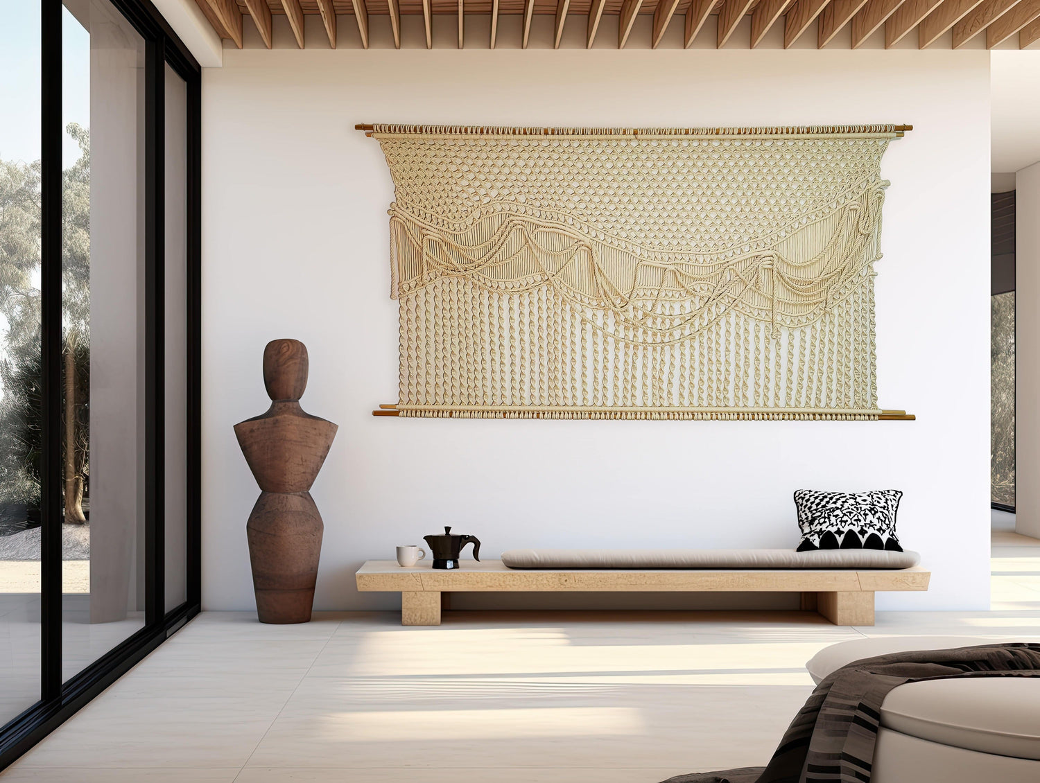 Handcrafted macramé and fibre art wall decor in a modern living room.